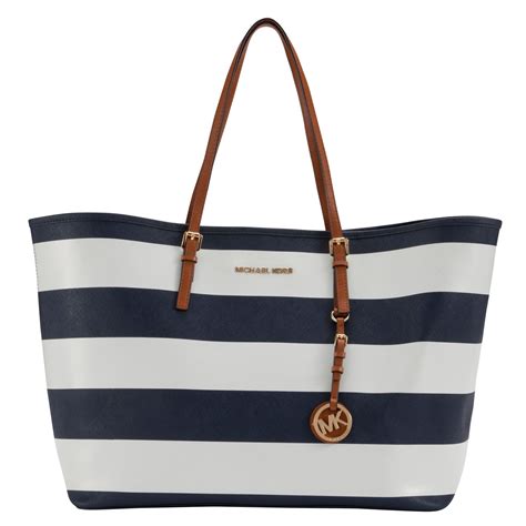 michael kors jet set travel tote navy white|michael kors bag with airplanes.